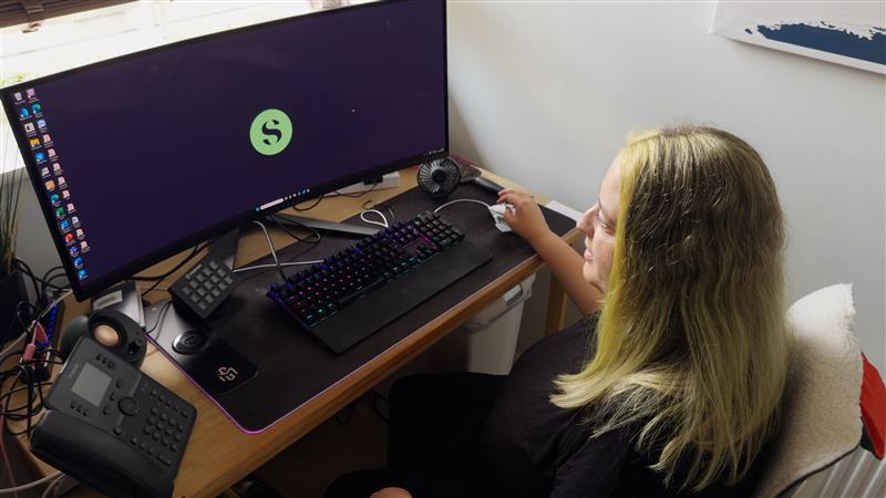 Laura Grounds at her desk